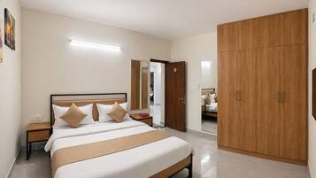 Deluxe Apartment, 3 Bedrooms | Desk, blackout curtains, soundproofing, iron/ironing board