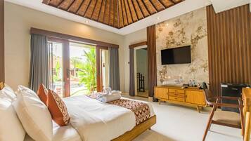 Suite, 1 King Bed, Pool View | Premium bedding, minibar, desk, laptop workspace