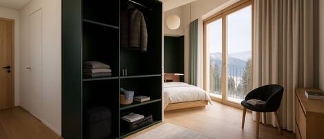 Chambre Deluxe | Coffres-forts dans les chambres, rideaux occultants