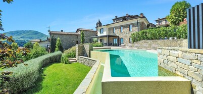 New! Villa, 'endless swimming' infinity pool; mountain views; walk facilities