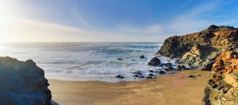 Homey dog friendly house with partial ocean views gas fireplaces and gas grill