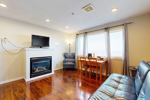 TV, fireplace - Dog Friendly Condo with Stunning Ocean Views and Easy Beach Access (Lincoln City)