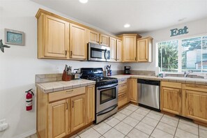 Fridge, microwave, oven, stovetop - Lincoln City Beach Retreat with Hot Tub, Patio & Game Room (Lincoln City)