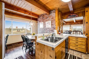 Fridge, microwave, oven, stovetop - Spacious Home with Two Large Decks and Ocean View Great for Groups (Lincoln City)