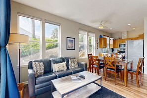 TV, fireplace - Waterfront home with private hot tub free WiFi firepit and shared dock (Lincoln City)