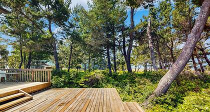 Waterfront house with bay and ocean views large deck and quiet location