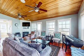 TV, fireplace, table football - Gorgeous ocean view home with hot tub game room steps to beach (Lincoln City)