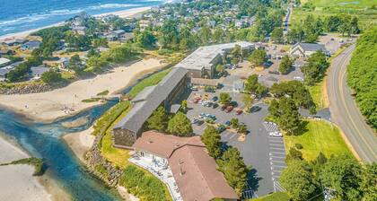 Dog friendly riverfront suite at oceanfront Proposal Rock Inn steps to beach