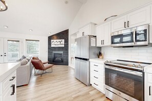 Fridge, microwave, oven, stovetop - Bright remodeled home with furnished deck and private beach access dog friendly (Pacific City)
