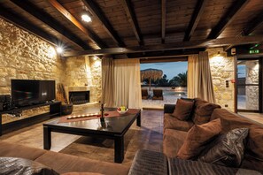 Thea Villa with Private Pool | Living area | 42-inch Smart TV with satellite channels - Palmrise Luxury Villas (Kassandra)