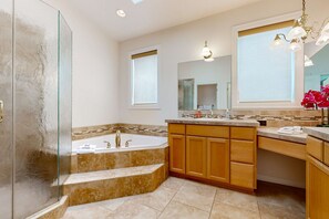 Shower, hair dryer, towels, shampoo