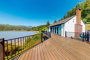 Terrace/patio - Bayview home with a deck overlooking the locally famous Ghost Hole fishing spot (Bay City)