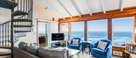 Télévision, cheminée, lecteur de DVD, chaîne hi-fi