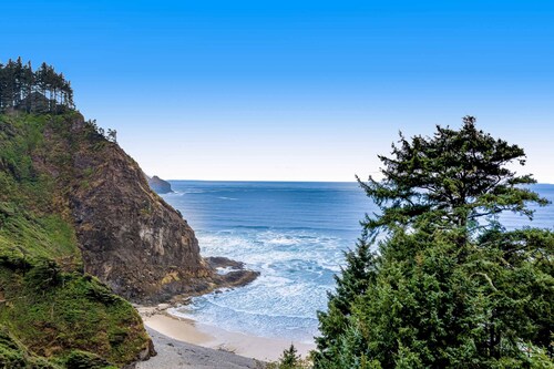 Cozy dog friendly home with ocean views a private hot tub and washer and dryer