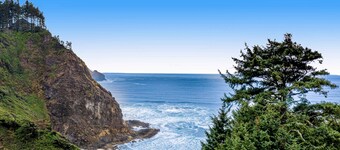 Cozy dog friendly home with ocean views a private hot tub and washer and dryer