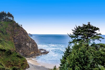 Cozy dog friendly home with ocean views a private hot tub and washer and dryer