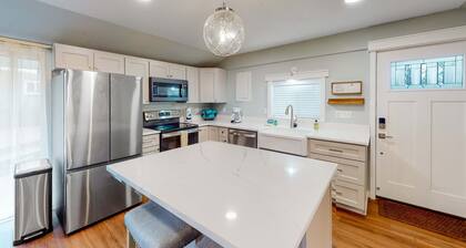 Renovated dog friendly cottage with a covered porch deck yard and washer dryer