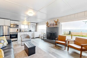 Interior - Quaint oceanfront hideaway with open layout fireplace central AC and gas grill (Netarts)