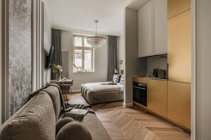 Comfort studio suite, uitzicht op de stad | Woonruimte