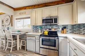 Fridge, microwave, oven, stovetop - Charming modern home close to the beach with full kitchen WiFi and large deck (Rockaway Beach)
