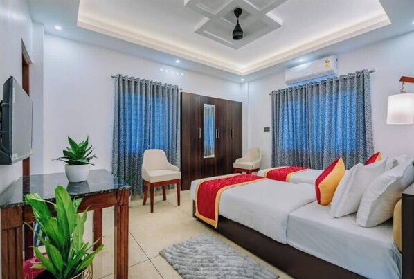 Deluxe Twin Room | Iron/ironing board, free WiFi - Airnest Airport Residency (Nedumbassery)