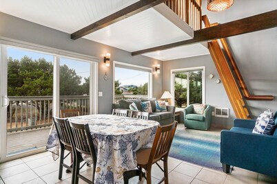 Dog friendly home across street from beach with rooftop deck and views