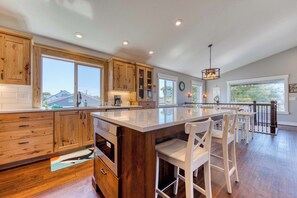 Fridge, microwave, oven, stovetop - Newly built home with lake view and game room steps to downtown walk to beach (Rockaway Beach)