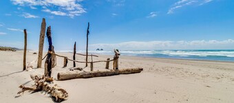 Beachfront condo boasting beautiful views a private balcony and perfect location