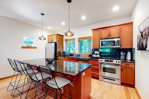 Fridge, microwave, oven, stovetop - Friendly Home with Private Hot Tub High Speed WiFi and Wood Burning Fireplace (Rockaway Beach)