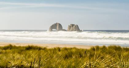 Rock Creek Inn condo on beach with ocean view balcony walk to shops and dining