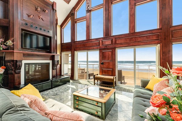 TV, fireplace, video games, DVD player - Oceanfront Villa with WiFi Private Hot Tub Balconies Beach Access and Game Room (Rockaway Beach)