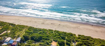 McKinnon's beach house oceanfront with beach views deck patio and fireplace dog friendly