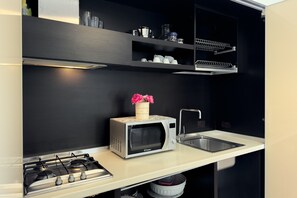 Fridge, oven, stovetop, cookware/dishes/utensils - Holiday Home 'Villa Cala Azzurra Porto Cesareo' with Private Garden and Air Conditioning (Scala di Furno)