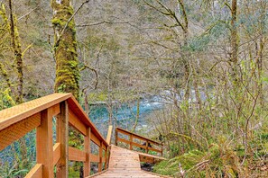 Property grounds - Dog friendly waterfront home on the Wilson River with great views deck and WiFi (Tillamook)