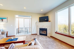 Télévision, cheminée, espaces bureaux