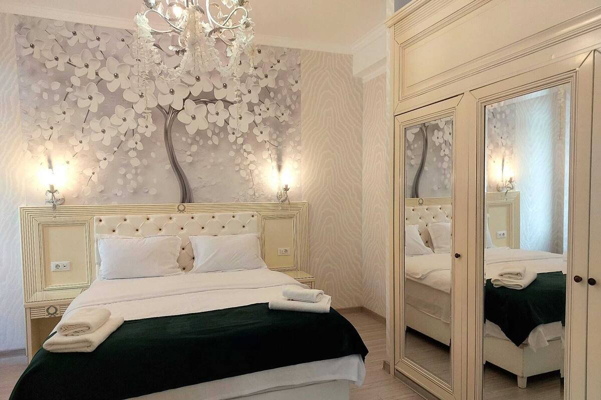 Deluxe Double Room, Balcony | In-room safe, iron/ironing board, free WiFi