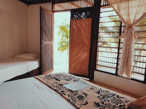 Standard Triple Room | Free WiFi - Hostal El Bohio (Palomino)