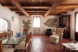 Apartment, 1 Bedroom | Living area | 30-inch TV with satellite channels - Casa al Duomo by Wonderful Italy (Telti)
