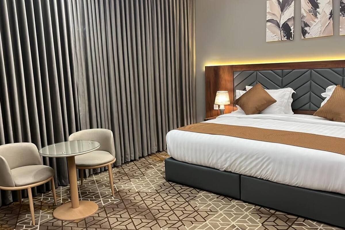 Luxury Double Room, Mobility Accessible | In-room safe, laptop workspace, blackout drapes, soundproofing