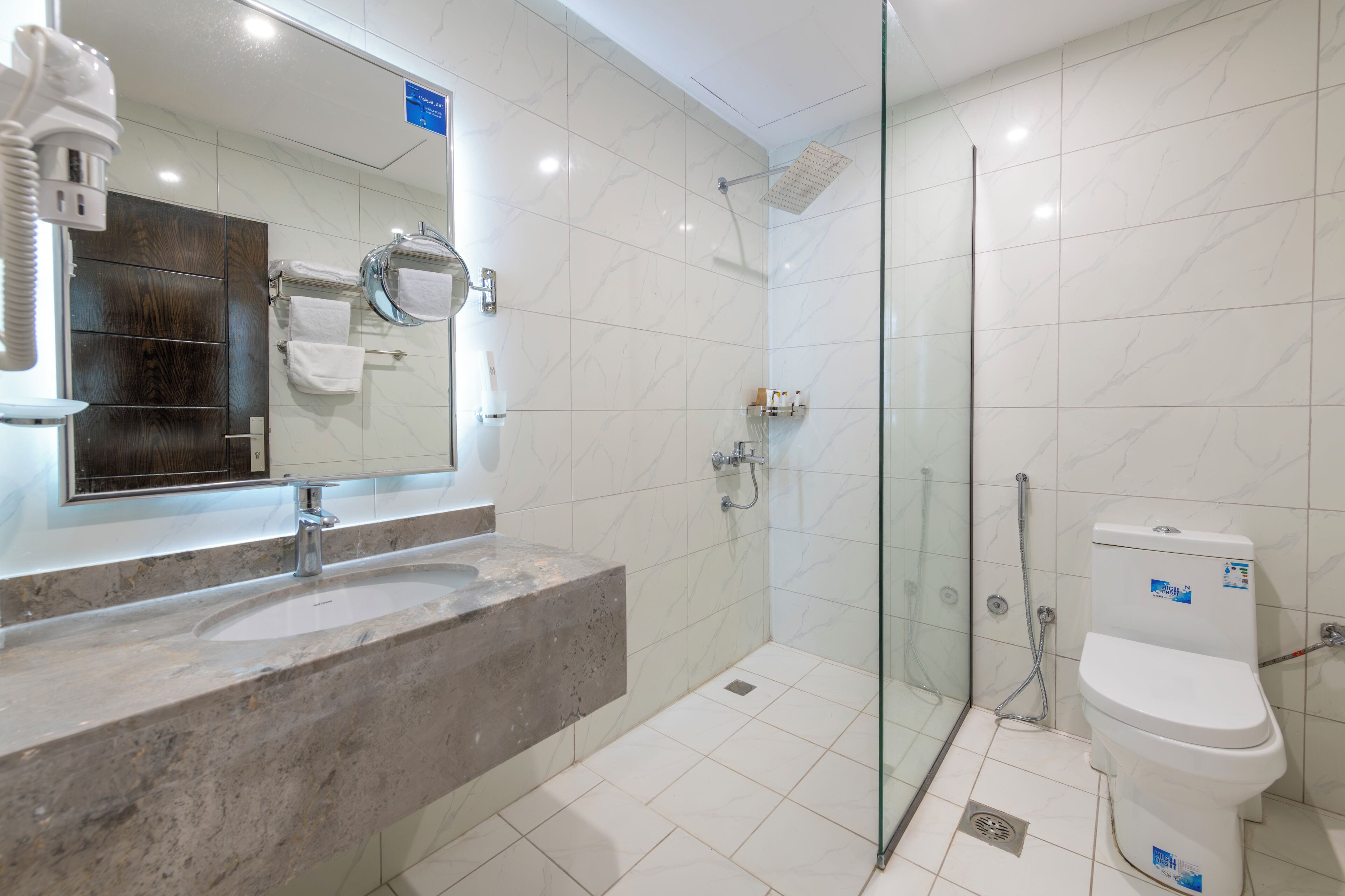 Hair dryer, towels, soap, shampoo