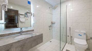 Hair dryer, towels, soap, shampoo