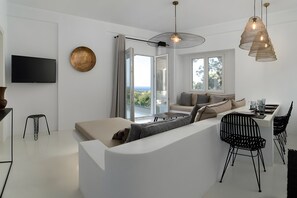 TV - Edem Garden Suite Country House with Sea View, Wi-Fi and Air Conditioning (Άνδρος)