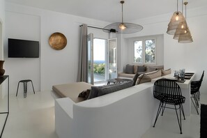 TV - Edem Garden Suite Country House with Sea View, Wi-Fi and Air Conditioning (Άνδρος)