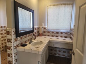 Shower, towels, soap, toilet paper