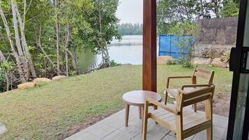 Deluxe Room, Multiple Beds, Patio, River View | Terrace/patio