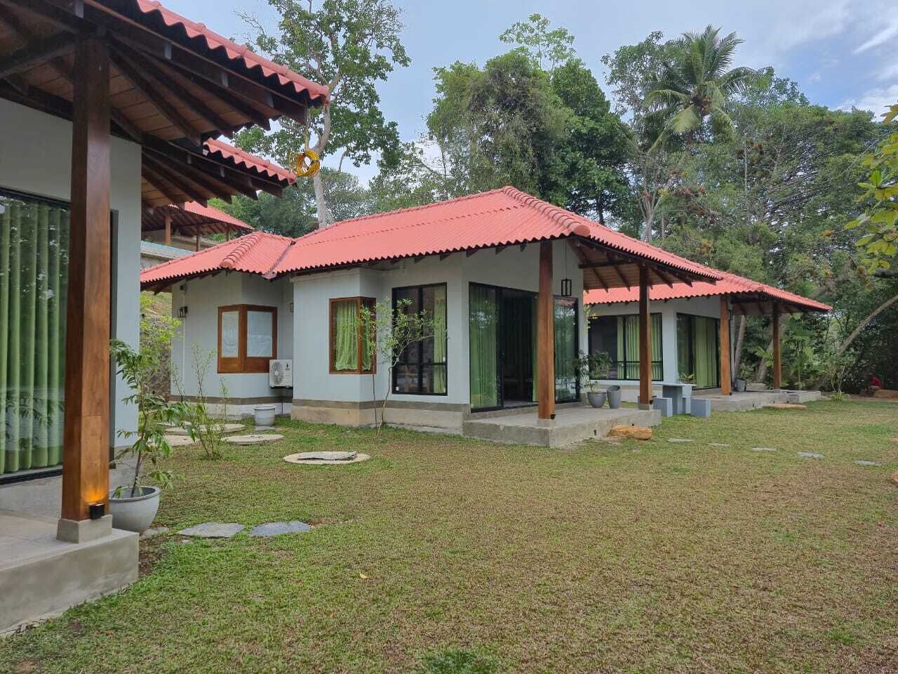 Habitación Deluxe doble, patio, vistas al lago | Minibar, mobiliario individual, escritorio