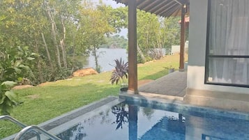 Superior Room, Patio, River View | Minibar, individually furnished, desk, laptop workspace