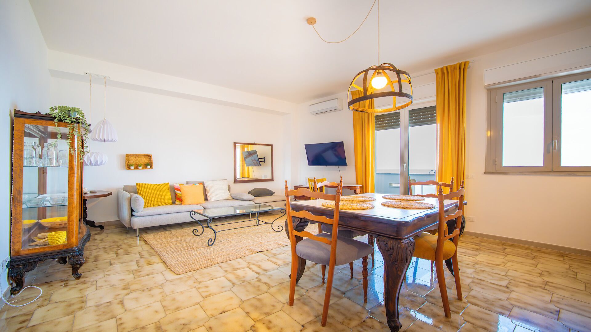 Apartment, Sea View | Living area | 32-inch flat-screen TV with cable channels