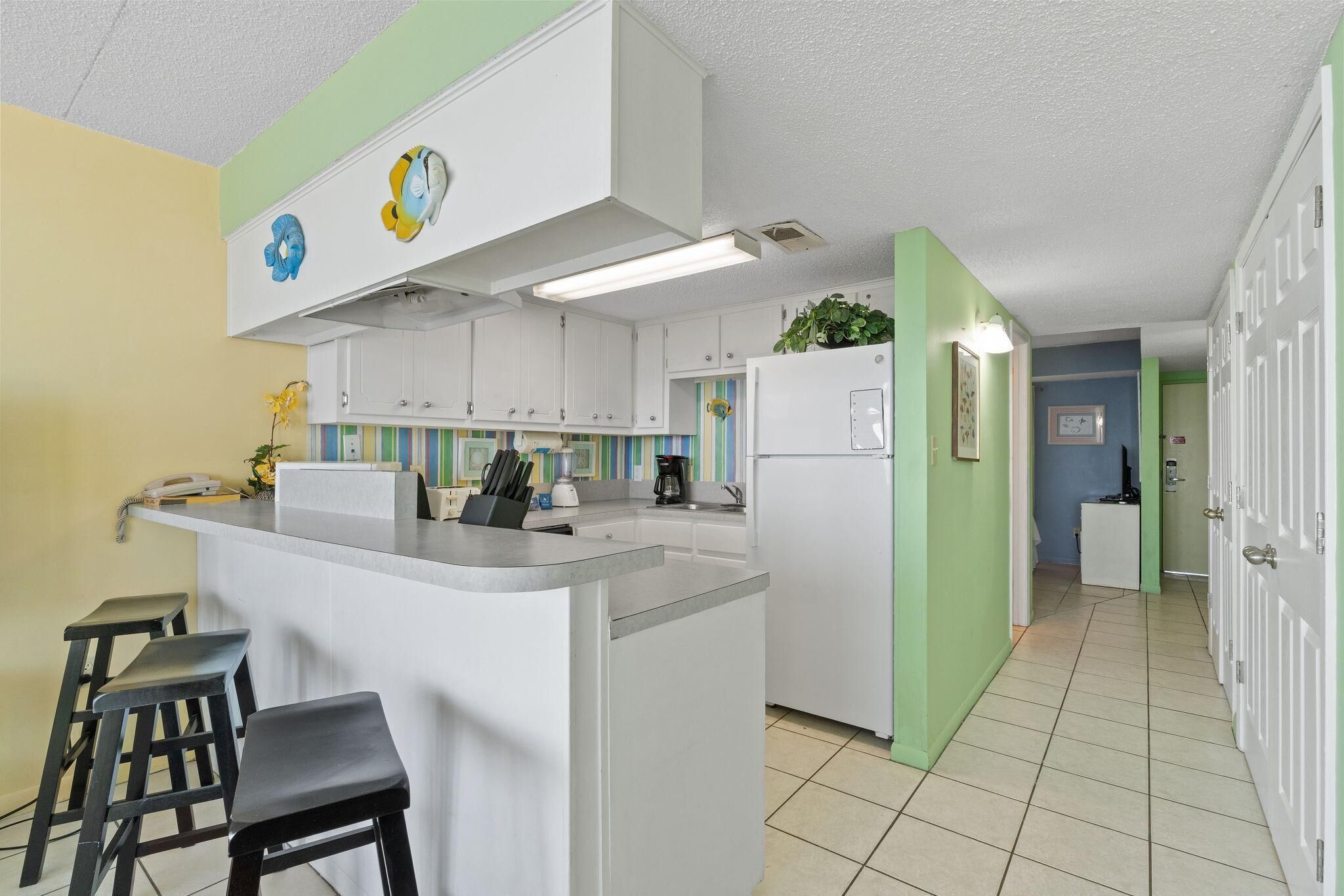Condo, 1 King Bed with Sofa bed (Island Winds East Unit 704) | Private kitchen | Oven, toaster