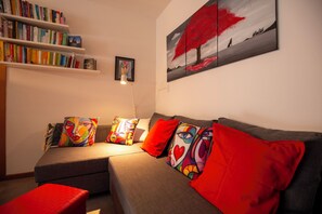 Apartment, Balcony, Mountain View | Living area | Flat-screen TV